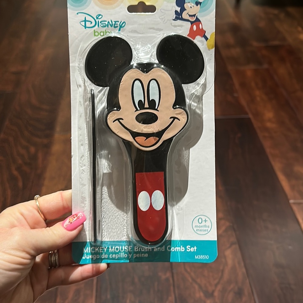Mickey Mouse baby brush and comb set. BRAND NEW. Non smoking household.